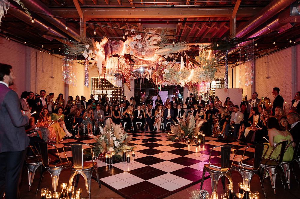 Groovy Wedding Ceremony Set Up With Disco Balls Checkered Floor