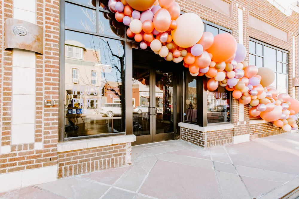 Balloon arch on the front of SKYLIGHT in Denver, CO