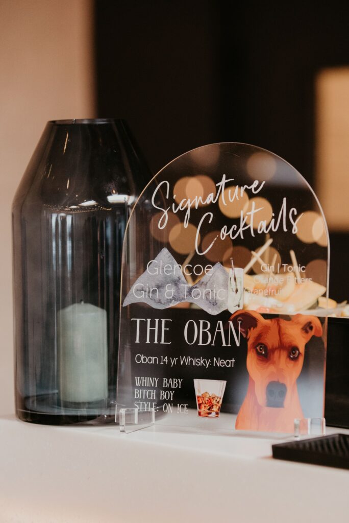 A signature cocktail display sign at a wedding at SKYLIGHT in Denver, CO.