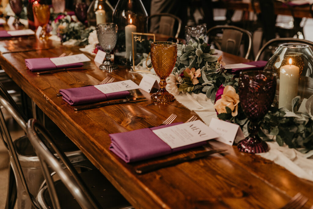 A jewel-toned tablescape for a wedding at SKYLIGHT in Denver, CO.