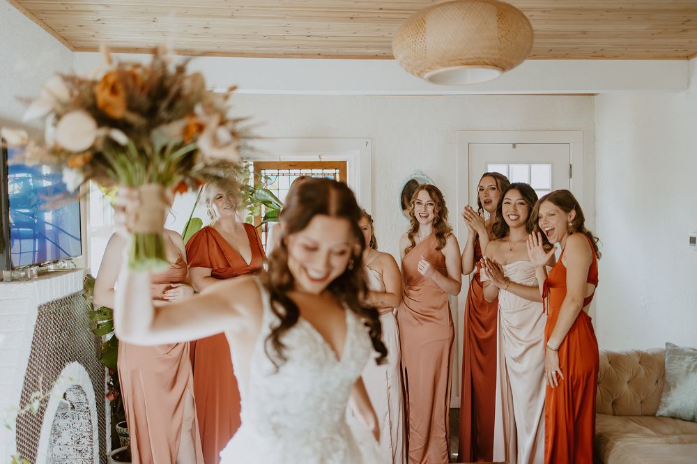 A wedding party getting ready at an AirBnB before their wedding at SKYLIGHT in Denver.