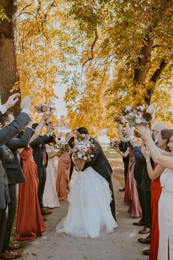 A wedding party taking pre-ceremony photos in Denver.