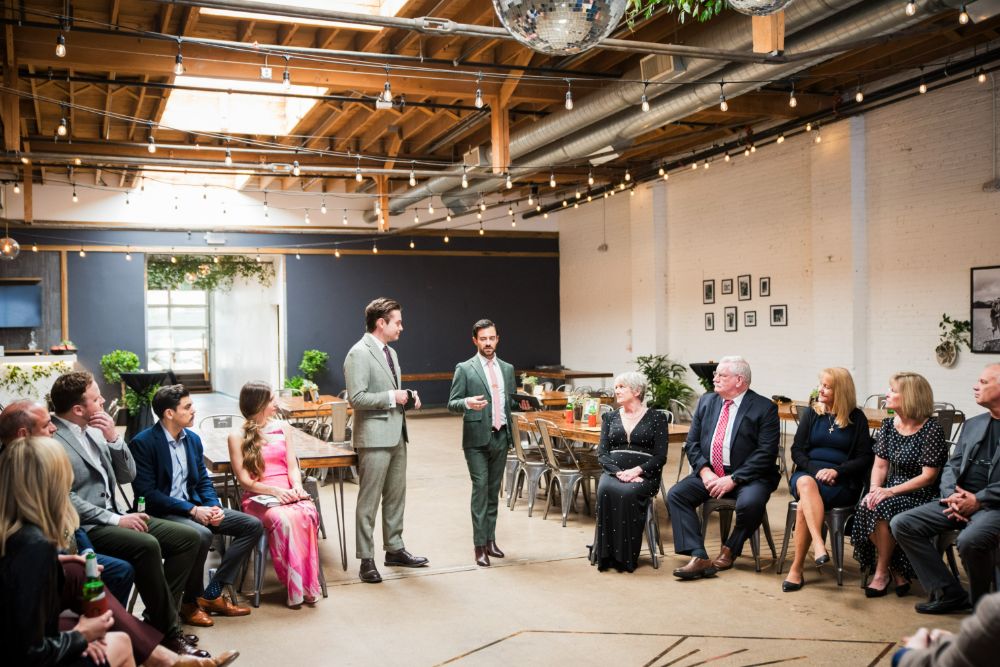 Groom + groom on their wedding day at SKYLIGHT