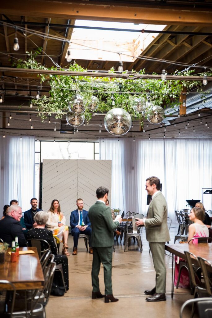 Groom + groom on their wedding day at SKYLIGHT