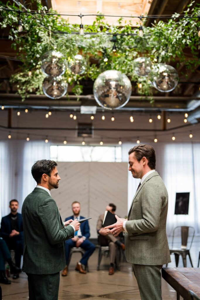 Groom + groom on their wedding day at SKYLIGHT