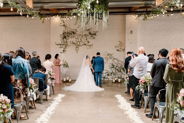 Vintage romance wedding ceremony at SKYLIGHT