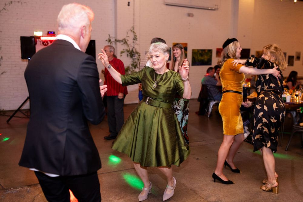 Guests dance at a Denver wedding at SKYLIGHT