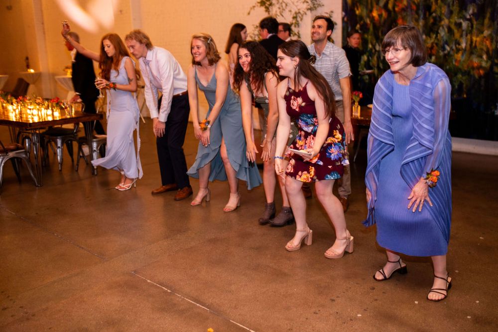 Guests dance at a Denver wedding at SKYLIGHT