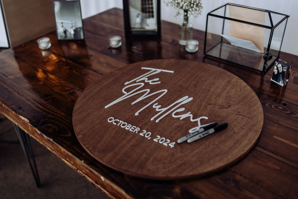 Wooden guest book at a wedding at SKYLIGHT