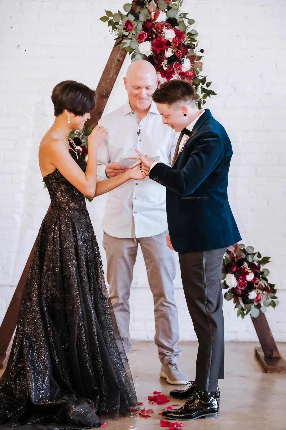 Two brides saying "I do" at SKYLIGHT