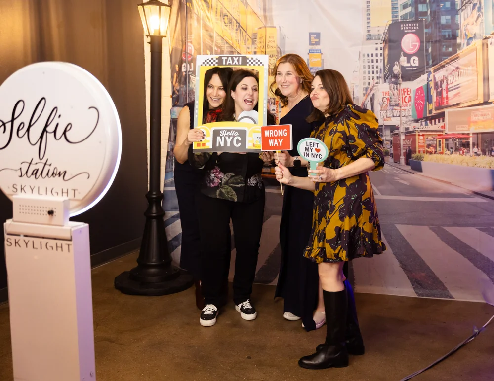 Guests taking photos at the selfie station at SKYLIGHT