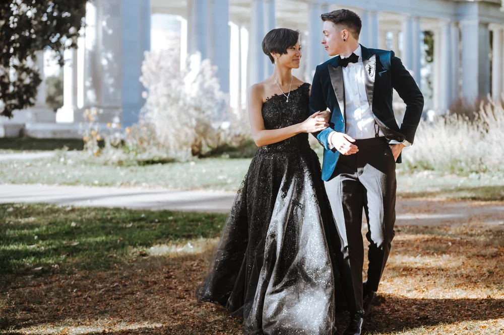 LGBTQ+ Couple walking outside in Denver, CO